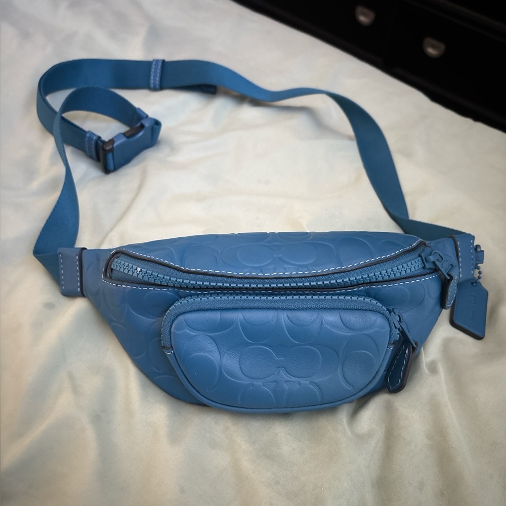 Coach BNWOT dark blue leather mini belt bag